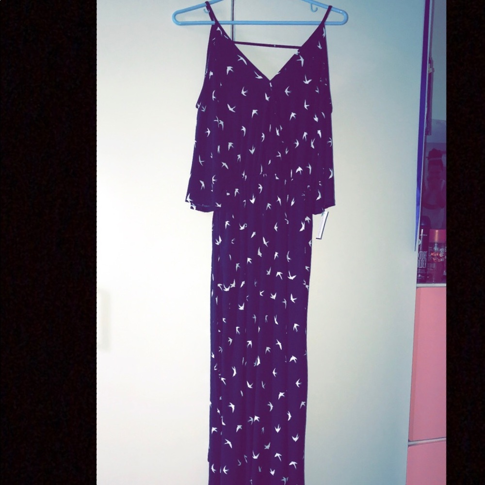 Navy colored flowing dress with white birds